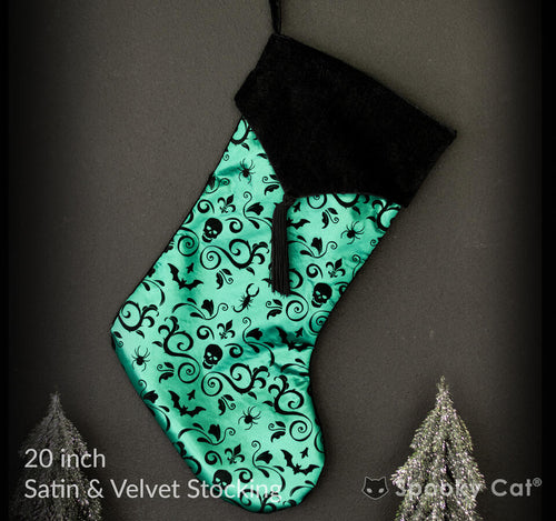 Green Gothic Creepmas stocking in purple satin with velvet cuff and silver details