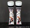 Front view of novelty Halloween socks featuring the Headless Horseman riding a black horse with red accents, surrounded by flying bats. The cuff reads "Halloween Forever" — spooky Sleepy Hollow-themed socks by Spooky Cat Press.