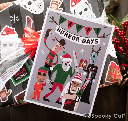 Happy Horror-Days card with illustrated horror characters like Jason, Freddy, and Pinhead in festive outfits