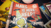 Skipper Hoss Art Print featuring a retro Martian encounter. Whimsical sci-fi décor celebrating friendly aliens, peace, and classic space fun.
