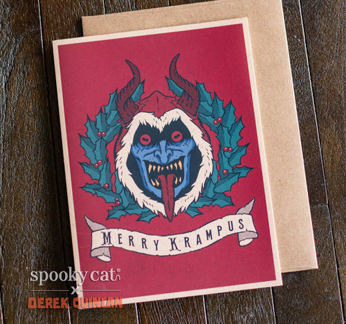 Merry Krampus vintage Creepmas card with blue Krampus face, red background, and holly wreath.