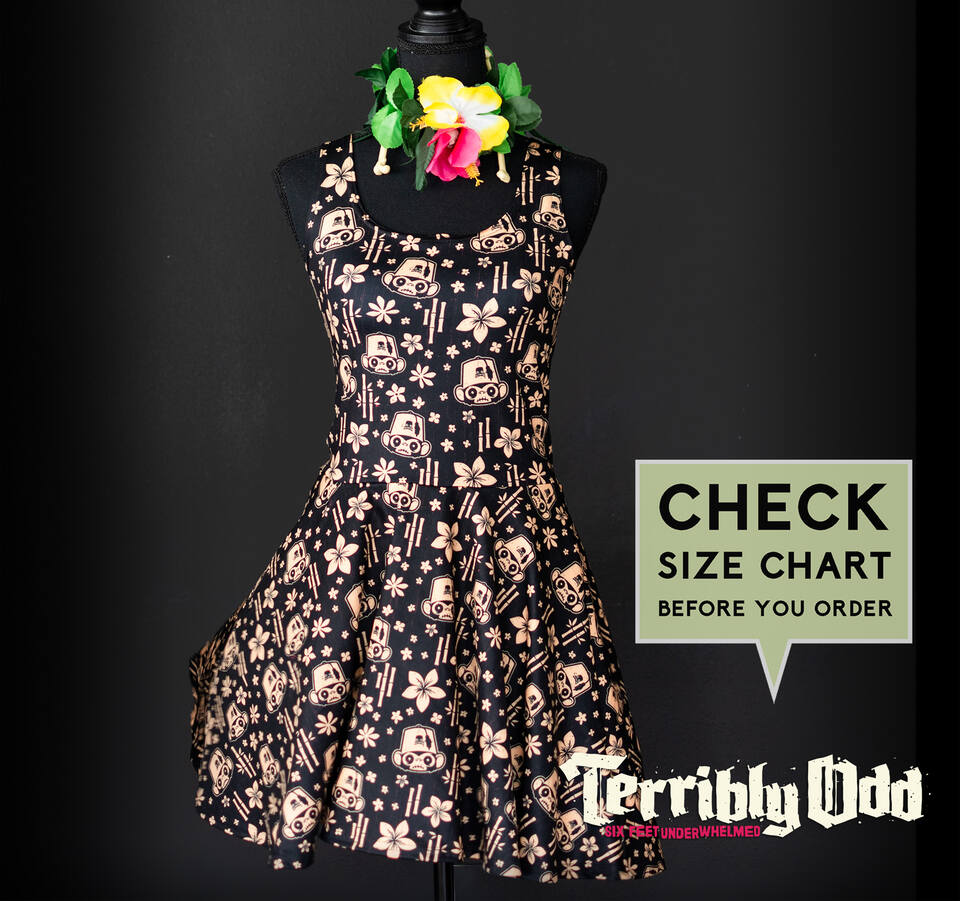 Terribly Odd Mr. Pernicious Tiki Dress featuring the iconic monkey idol, tropical flowers, bamboo accents, and a size chart reminder.