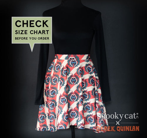 Vintage Stripe Krampus Button-Up Shirt by Derek Quinlan with red and cream stripes and Krampus design for festive gothic holiday wea